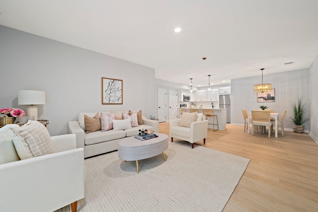 a living room with furniture and a couch