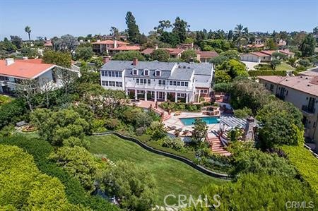 an aerial view of a house with a garden