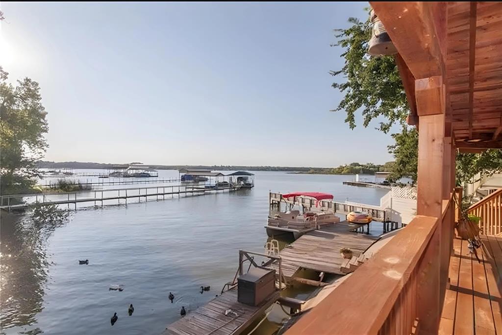 a view of a balcony next to a ocean view