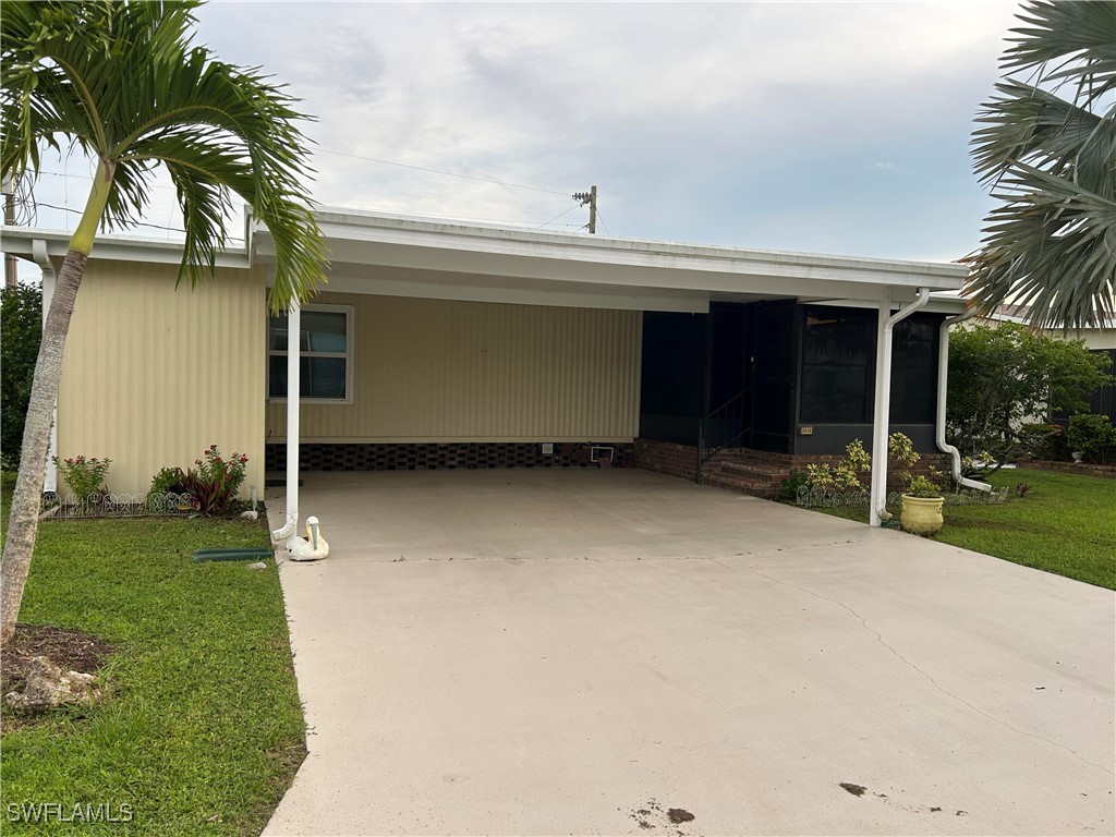 front view of a house with a yard