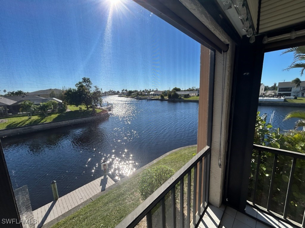 a view of swimming pool from a balcony