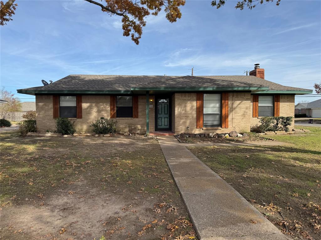 front view of a house with a patio