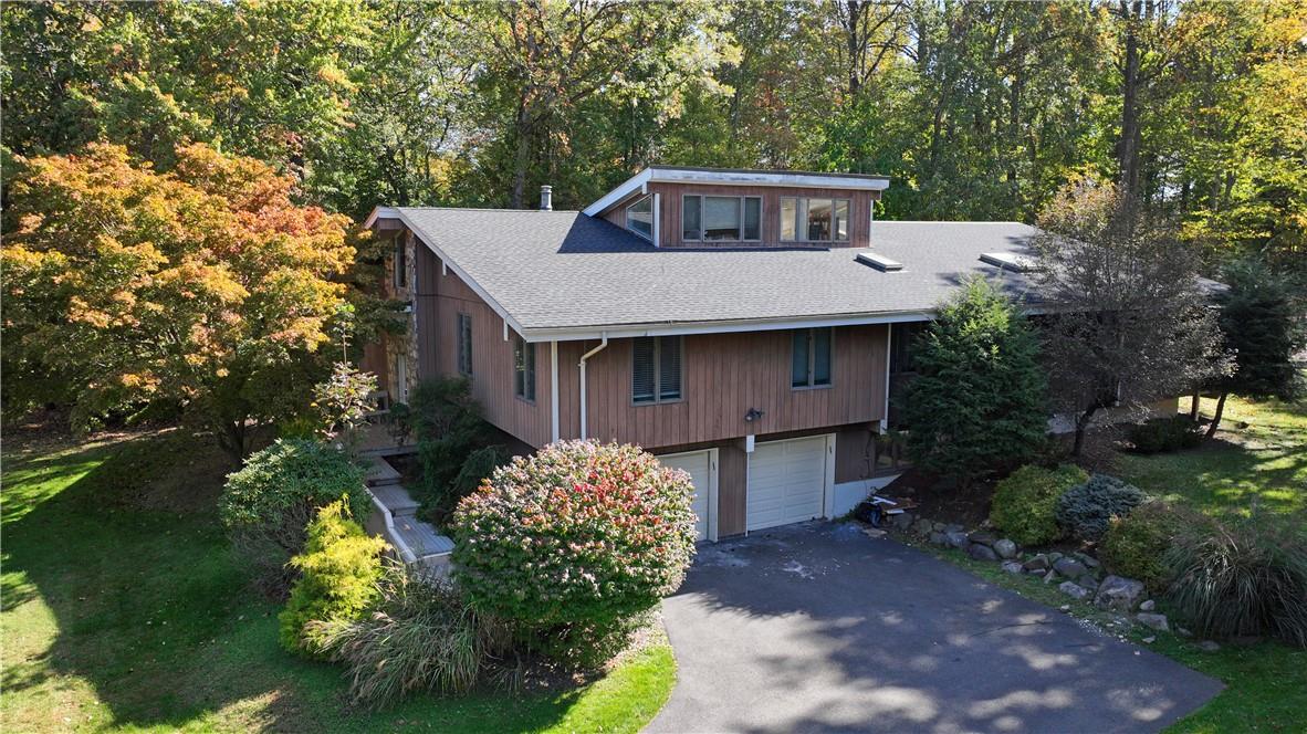 View of front facade featuring a garage