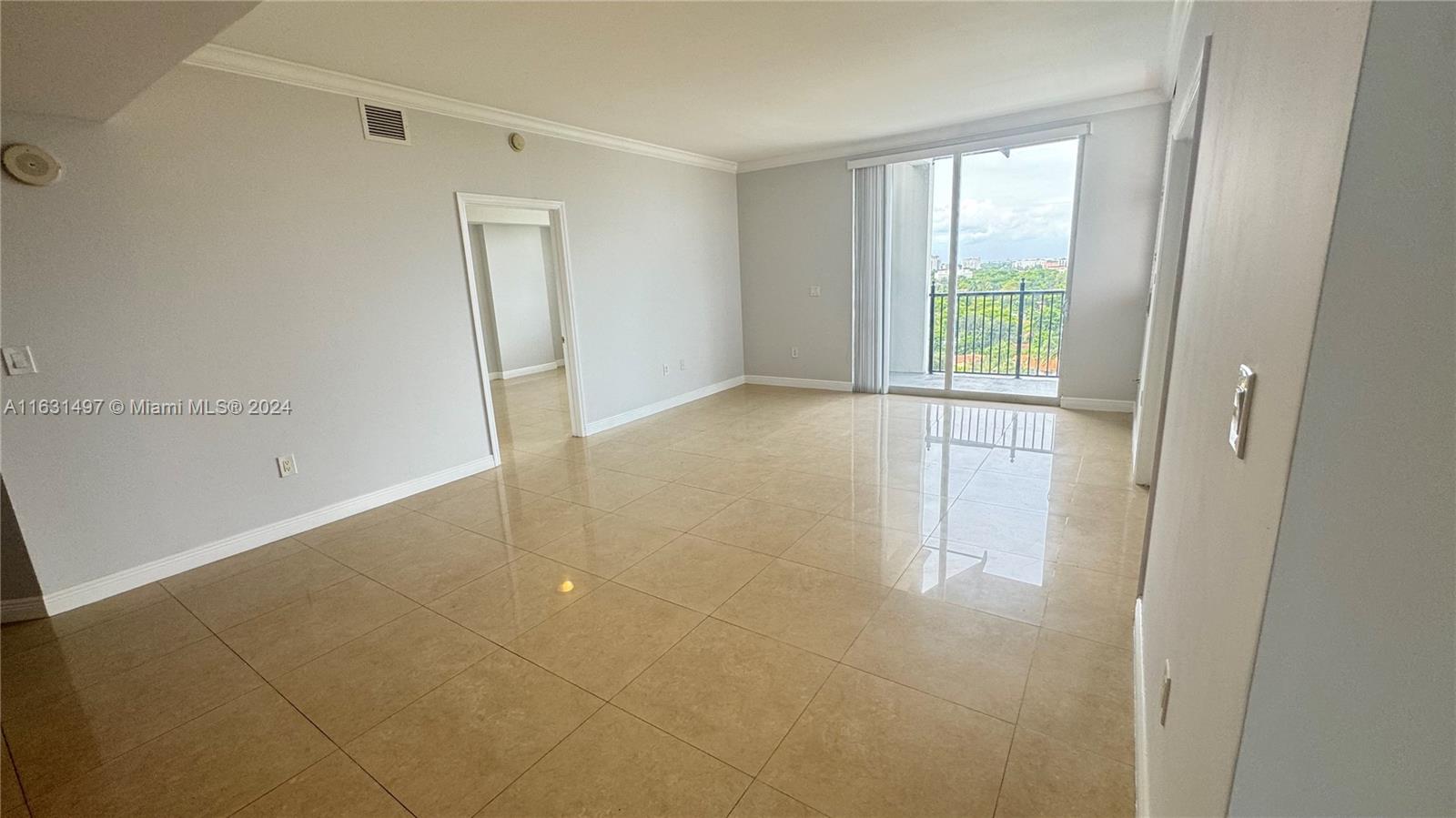 a view of an empty room and window