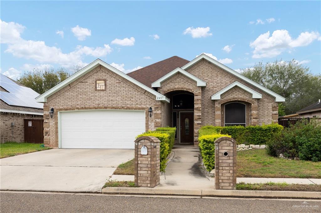 View of front of house with a garage