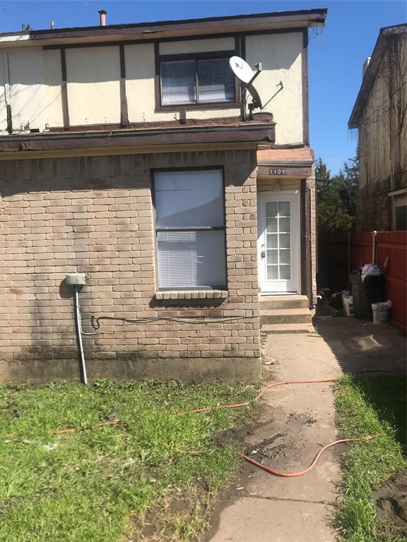 a house view with a backyard space