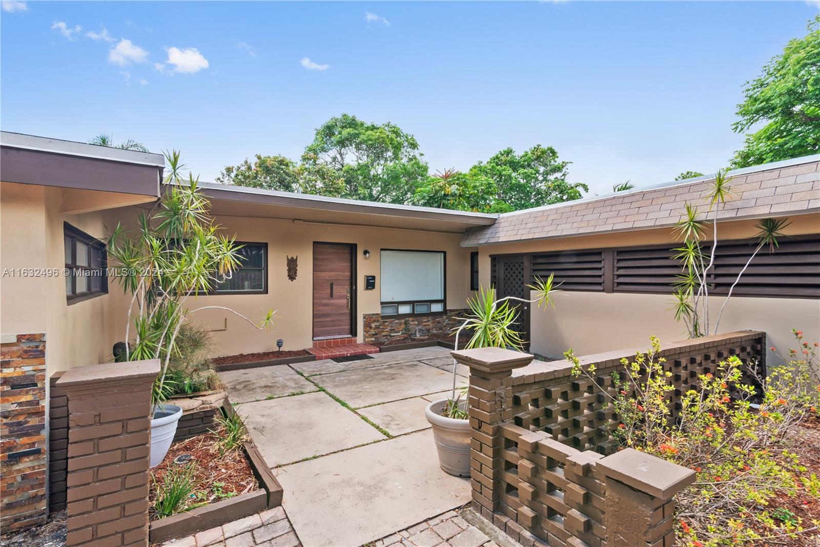 front view of a house with a patio