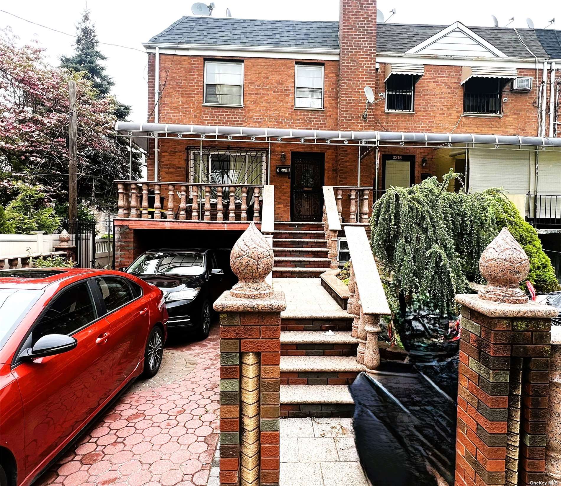 a front view of house and yard with seating space