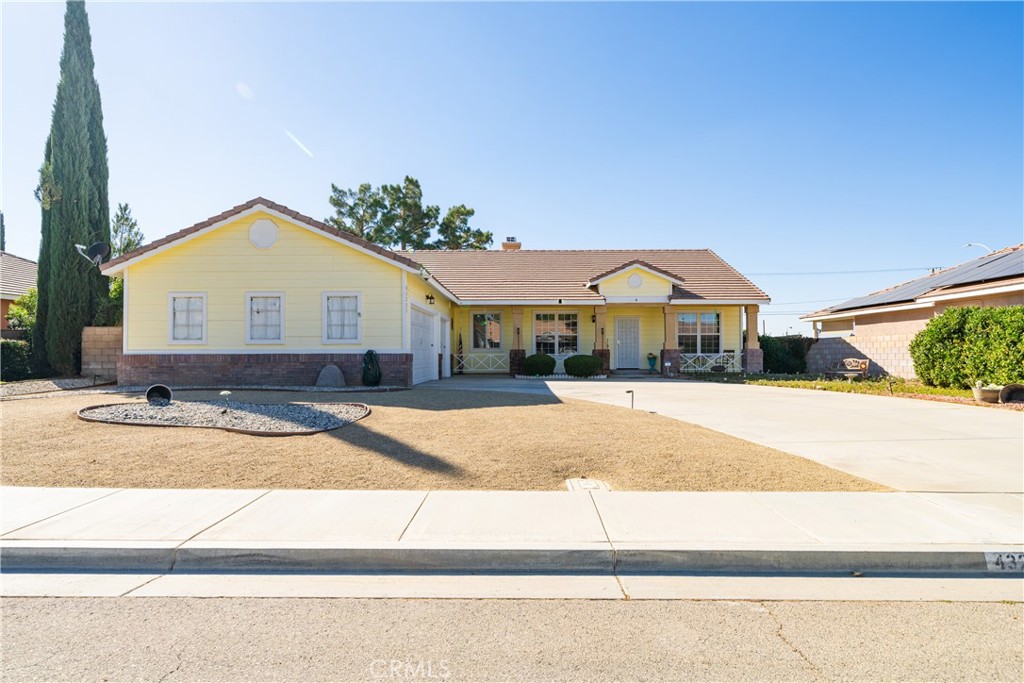 a front view of house with yard