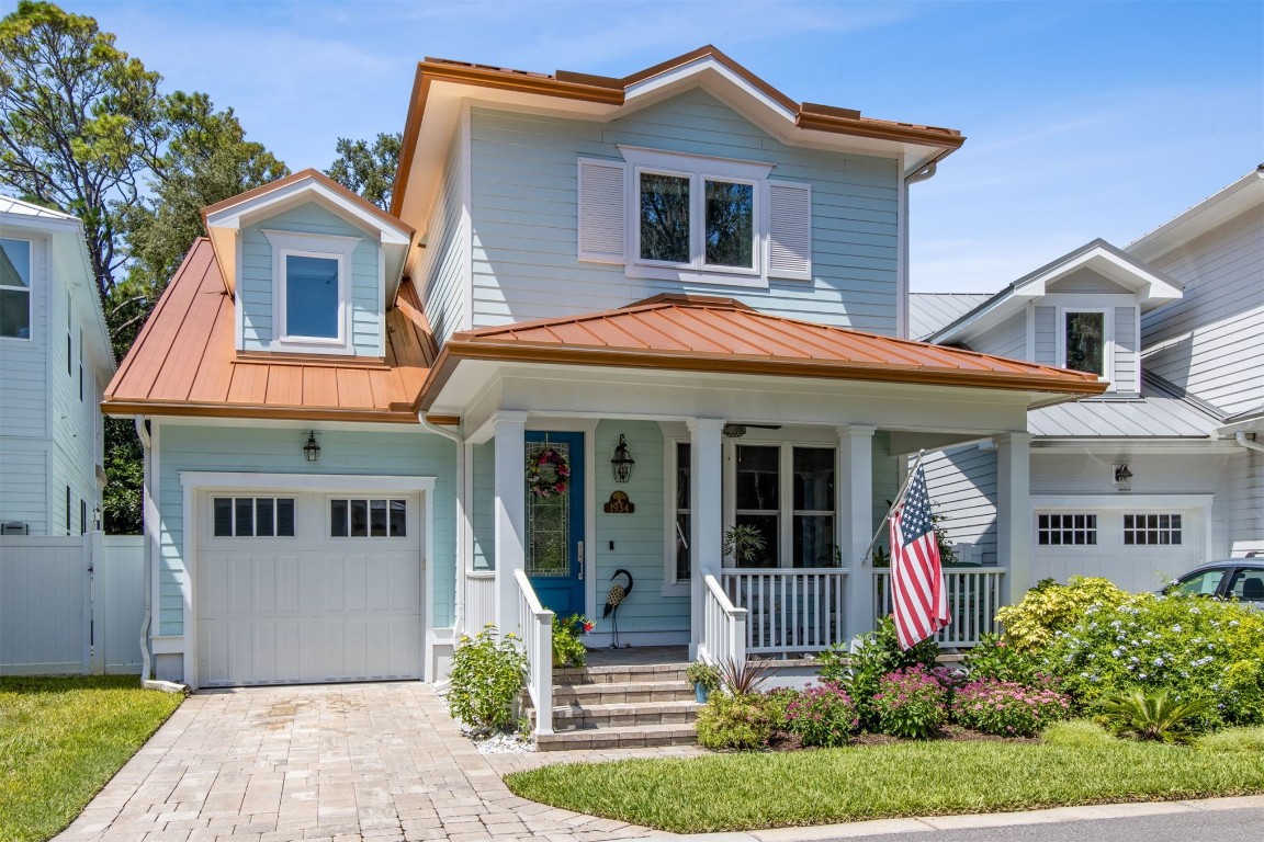 a front view of a house with a porch