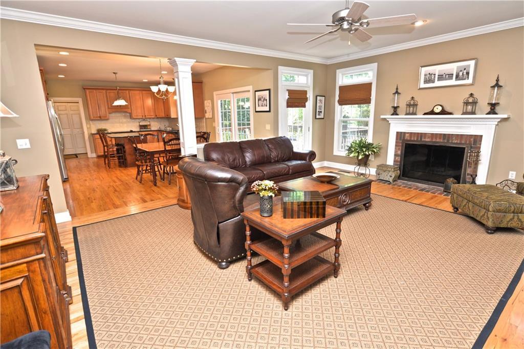 Family Room With French Door Access To Deck Is Open To Kitchen