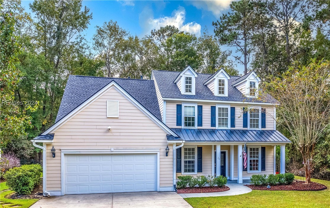 View of front of house featuring covered porch, a