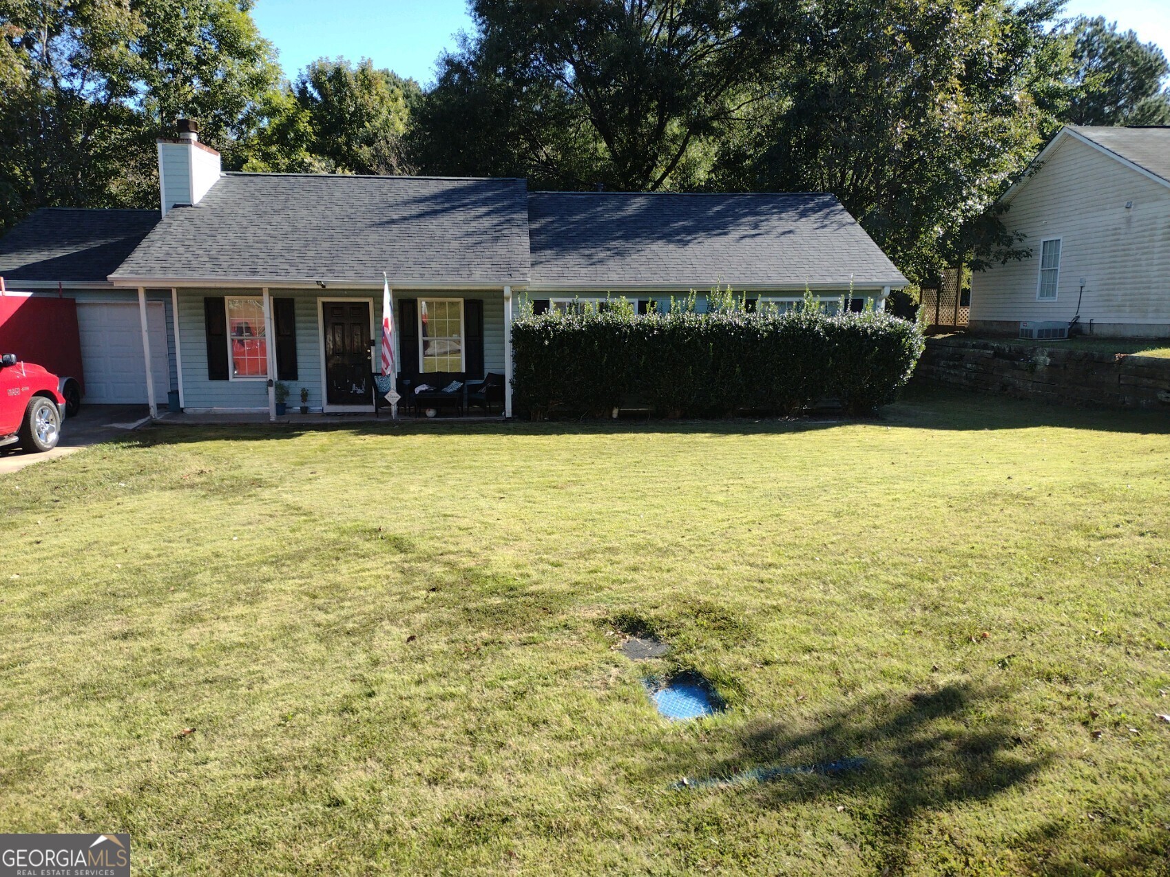 a view of house with ocean view