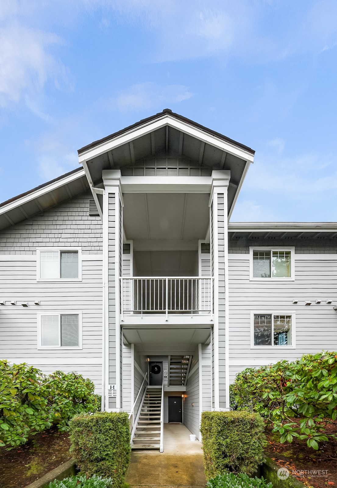 a front view of a house with a porch