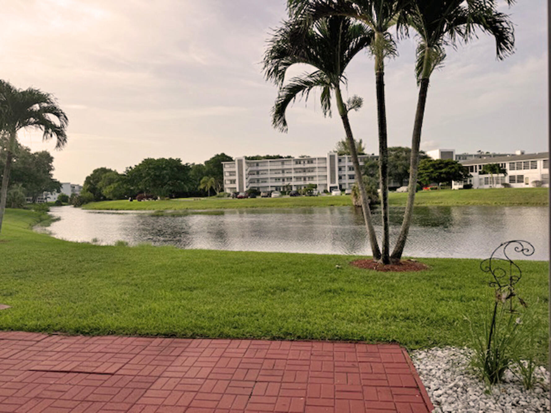 a view of a lake with a big yard