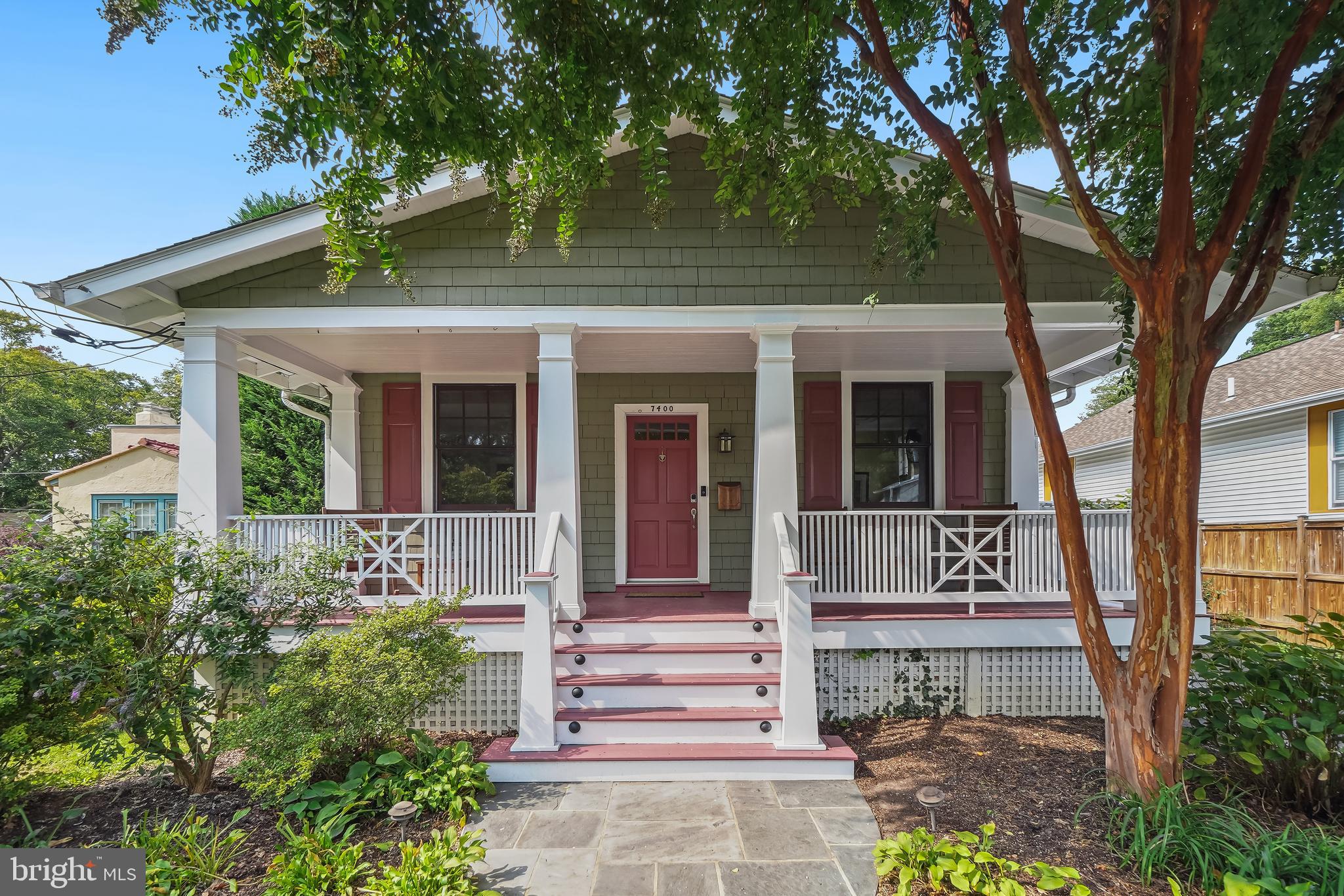 a front view of a house with a porch