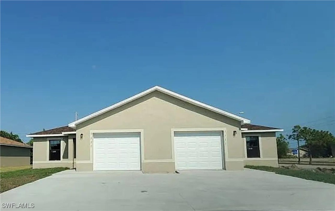 a front view of a house with yard