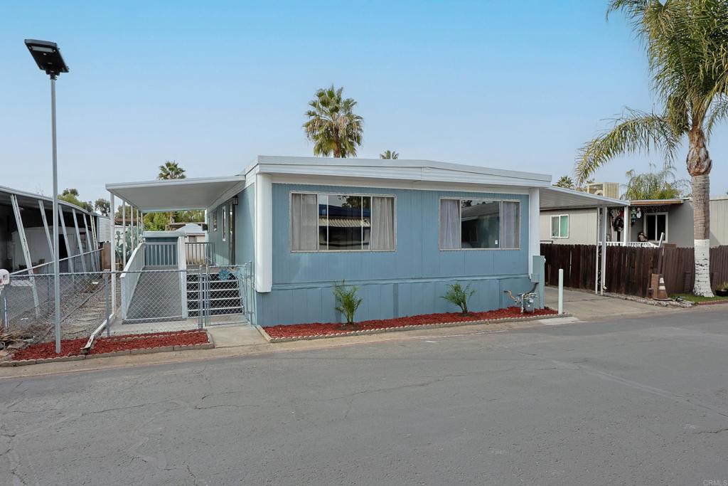 a front view of a house with a garage