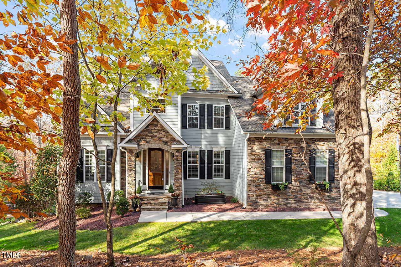 front view of a house with a yard