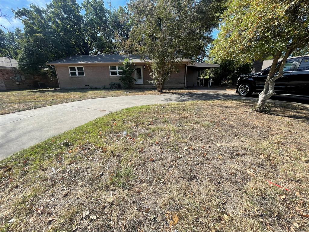 a front view of a house with swing