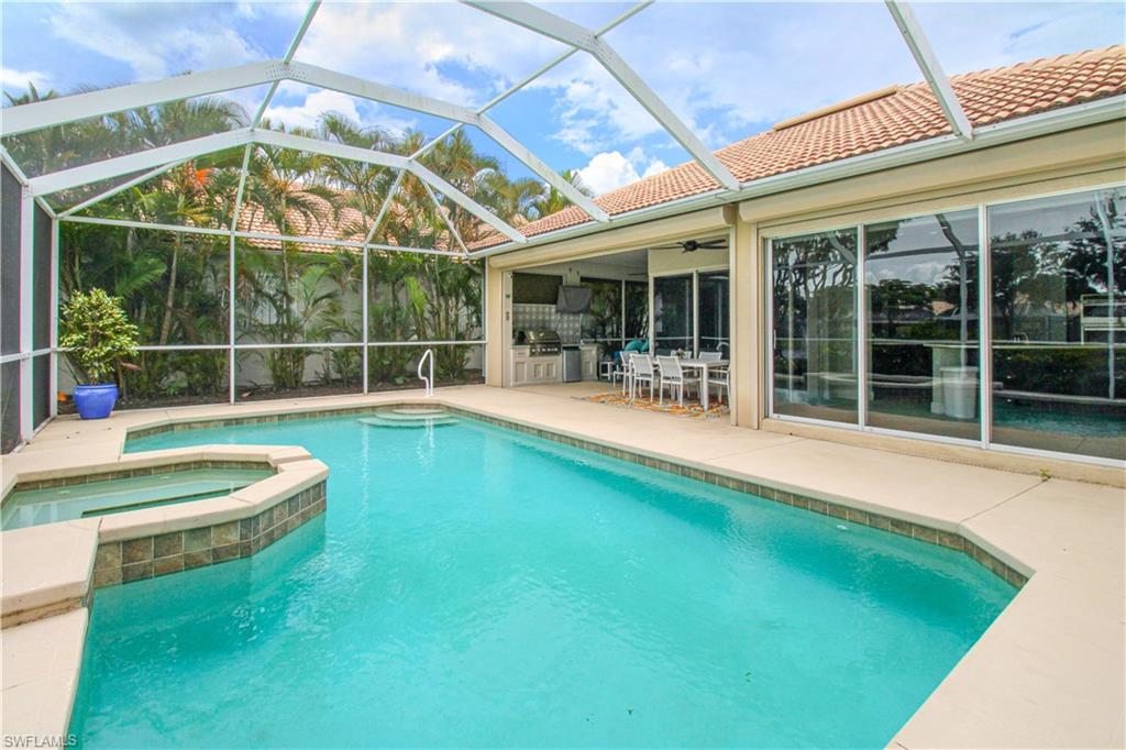 a view of a swimming pool with a patio