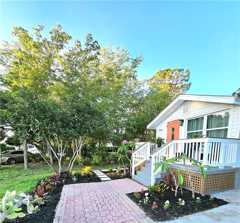 a house view with a garden space