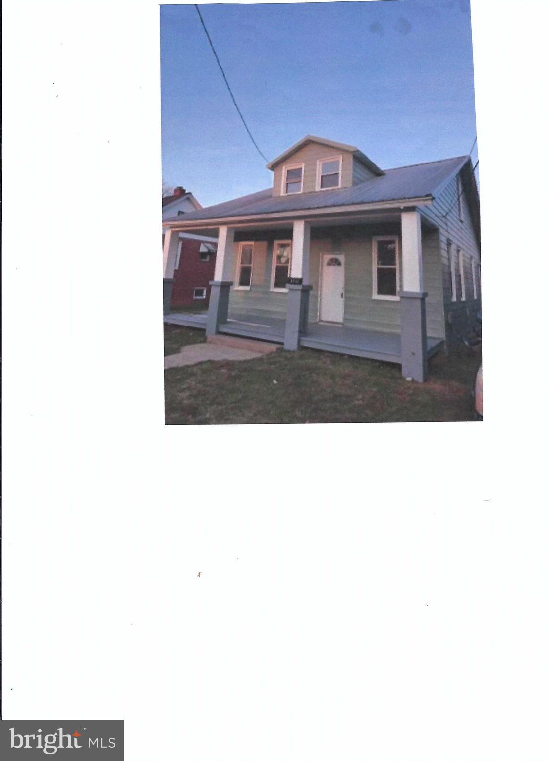 a front view of a house with a garage