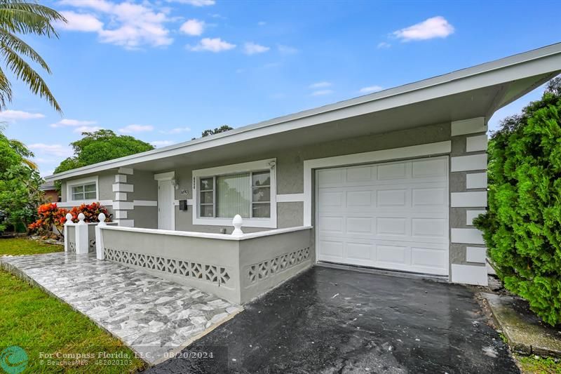 a view of house with an outdoor space