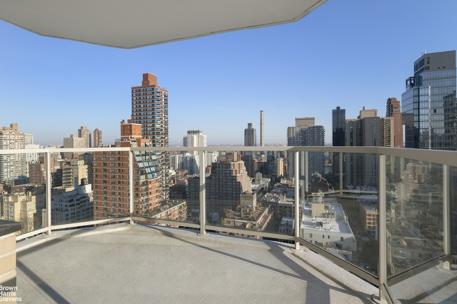 a view of a city from a balcony