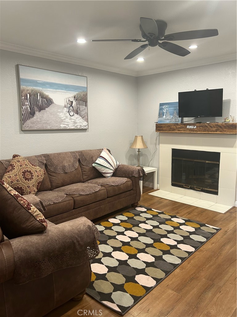 a living room with furniture and a fireplace