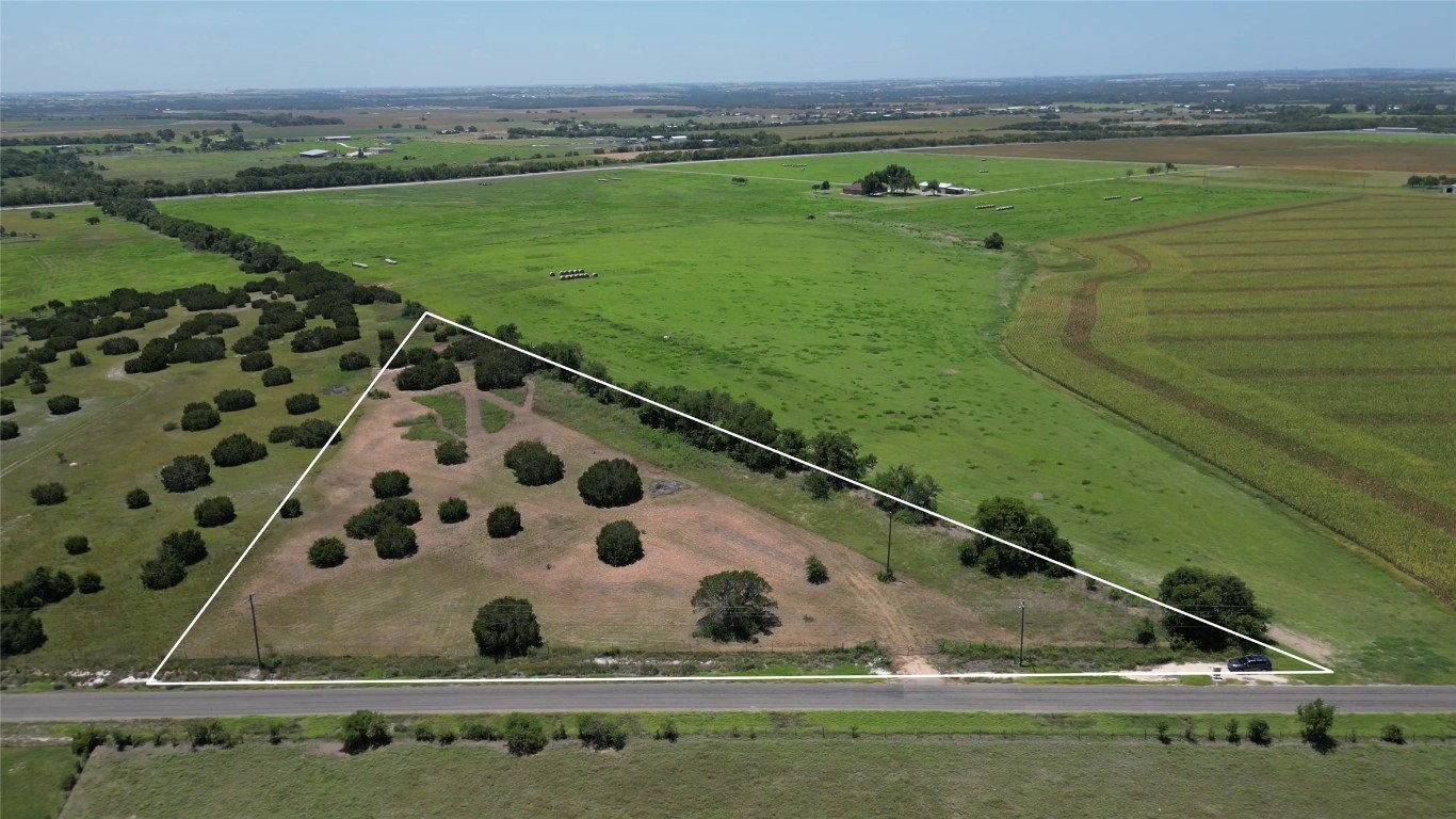 a view of a lush green field