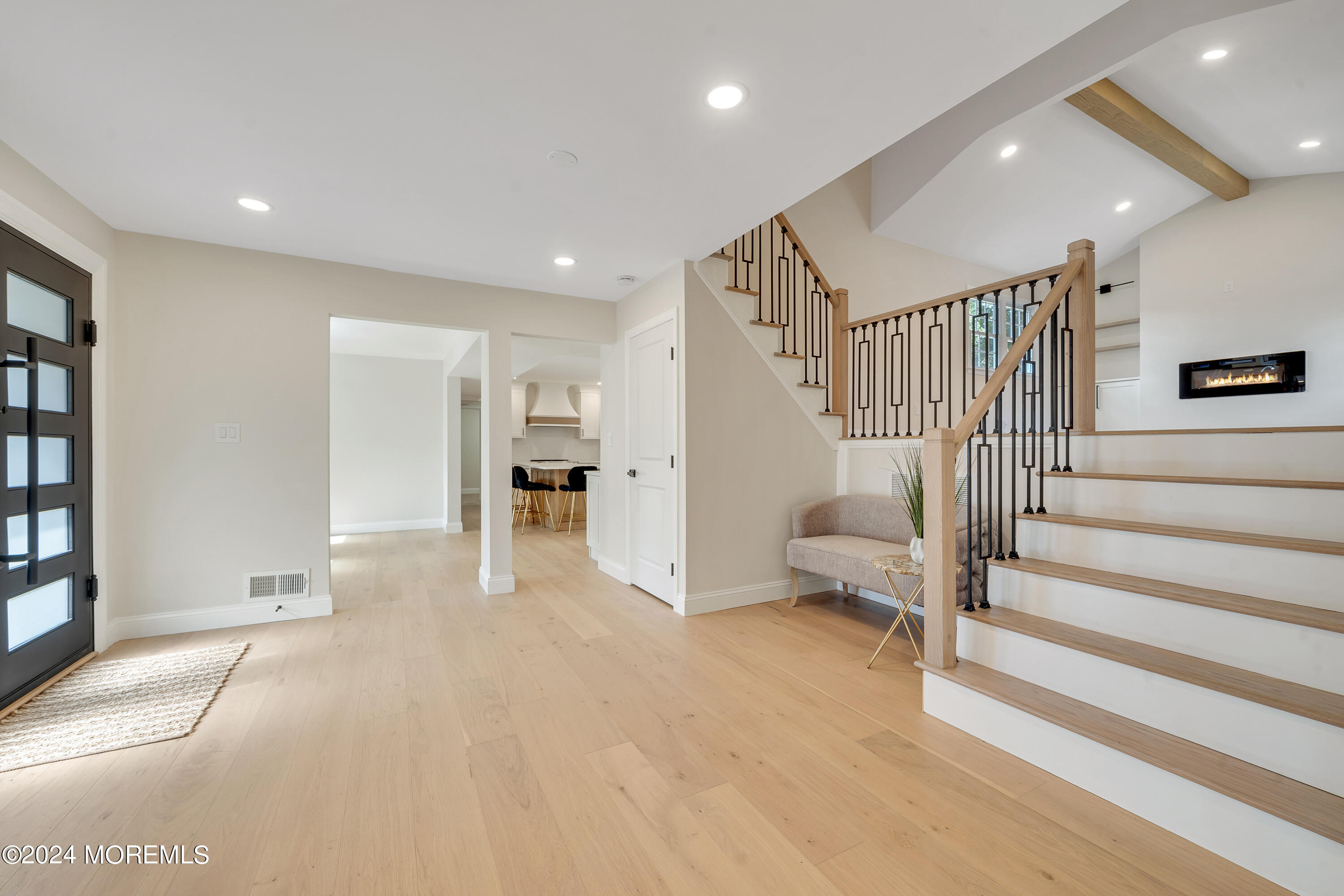 a view of entryway with livingroom