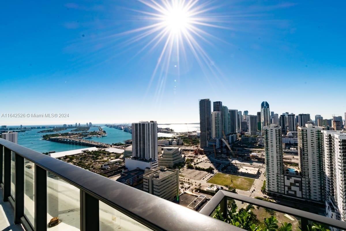 a view of a balcony with city view