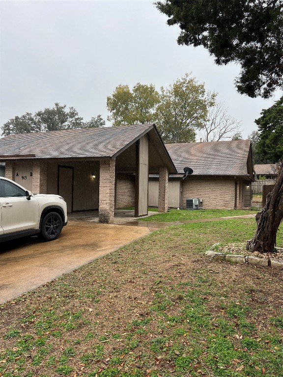 Front view, carport and driveway