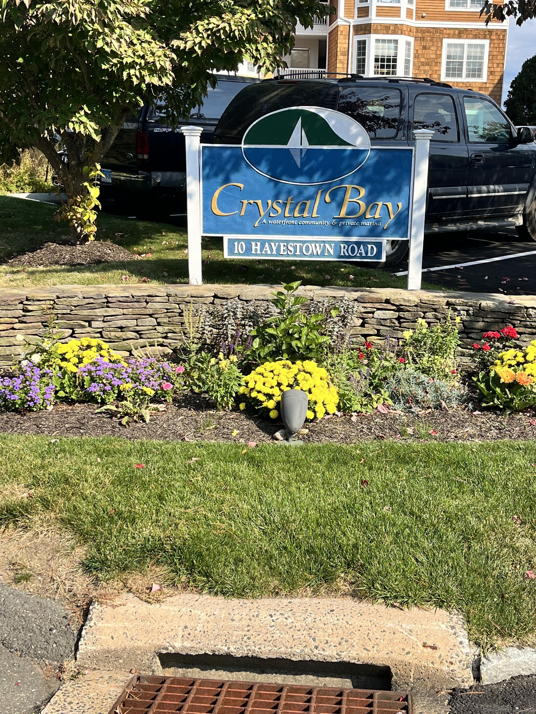 a sign that is sitting in front of a house