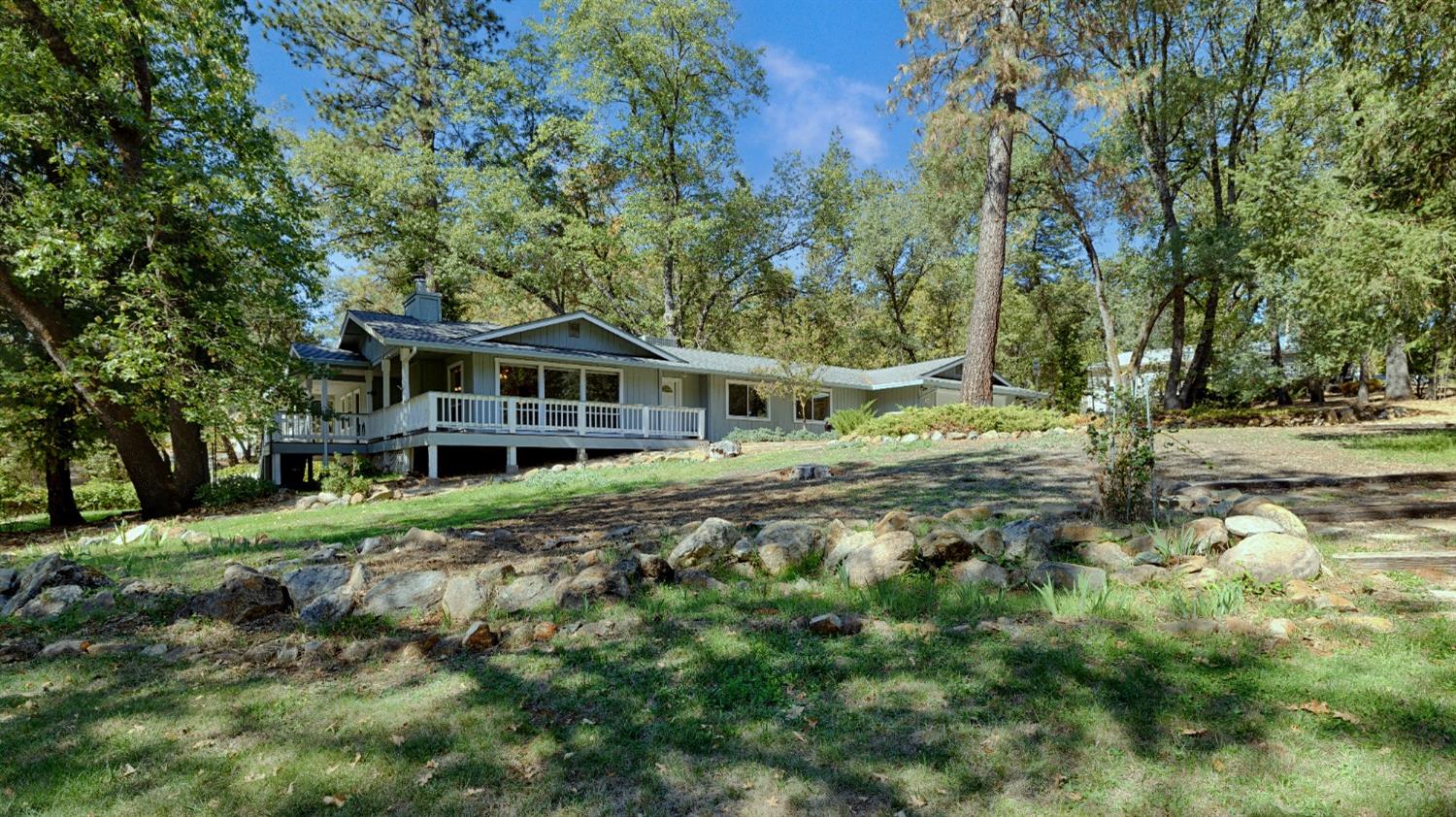 a house with trees in the background