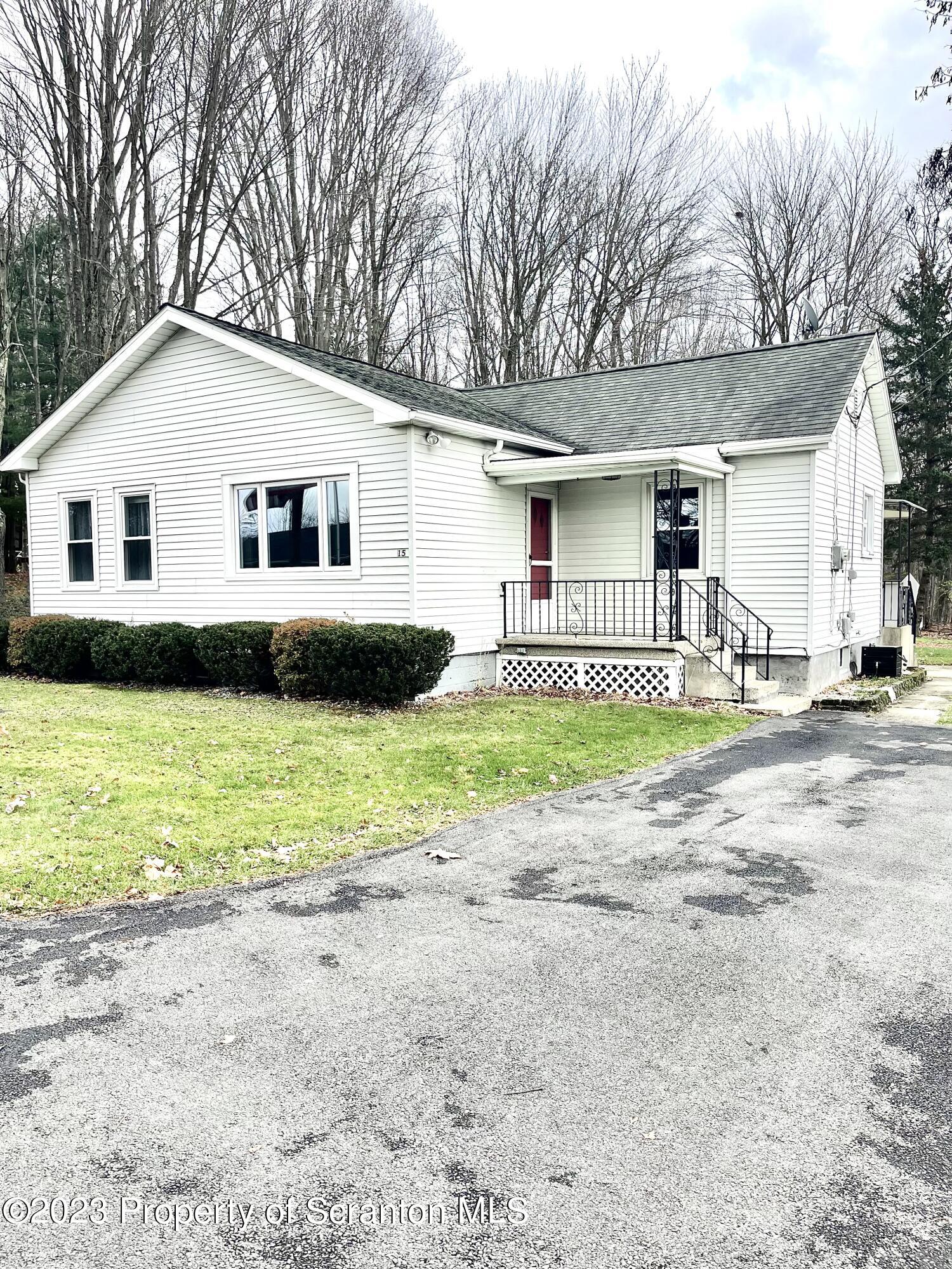 a house with yard in front of it