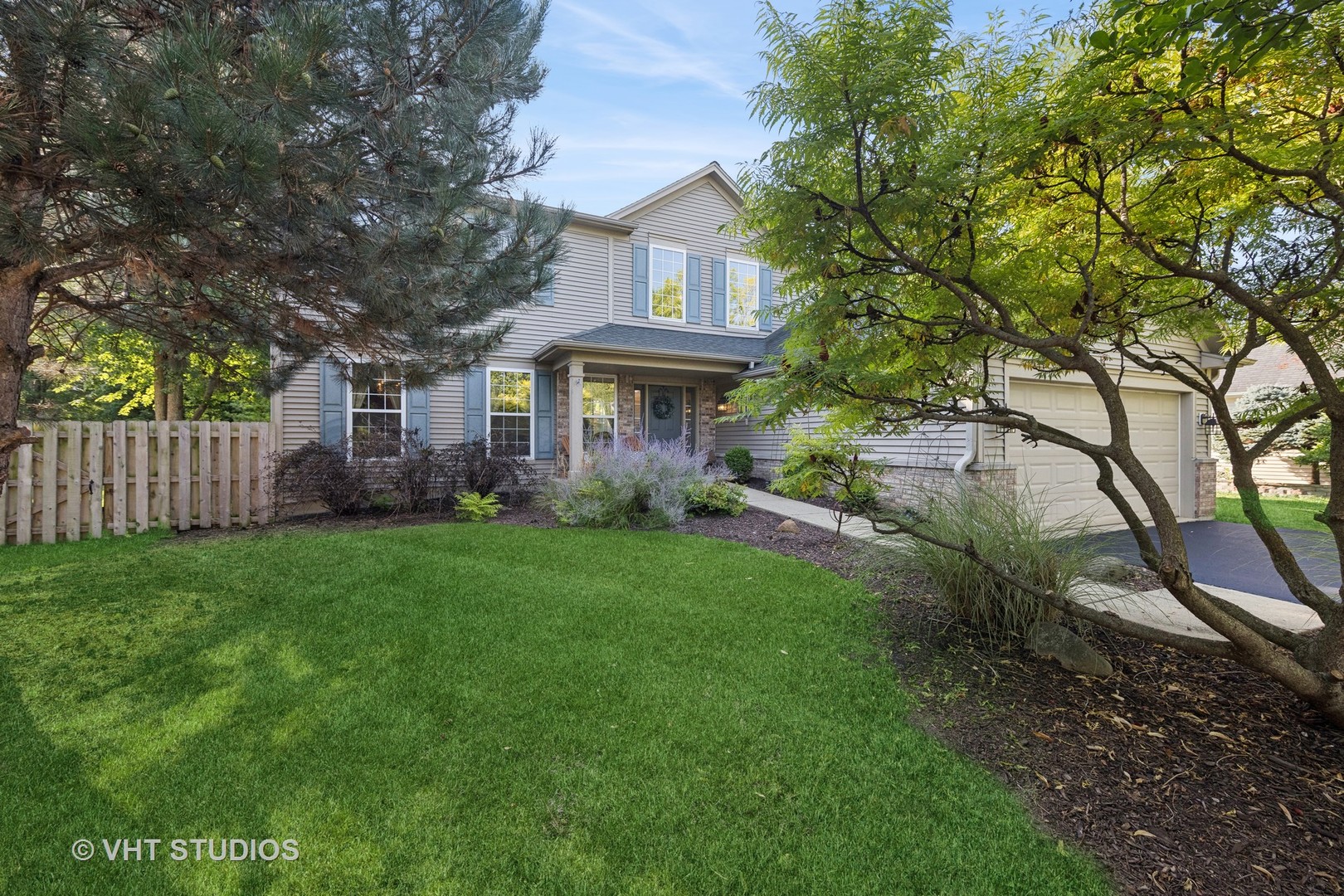 a house view with a garden space