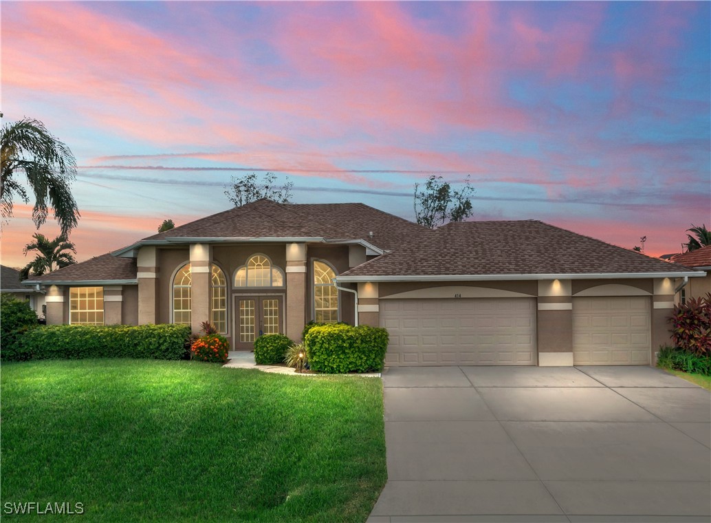 front view of a house with a yard