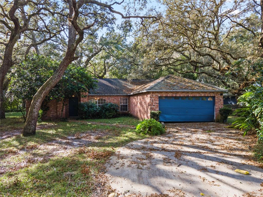 a front view of a house with yard