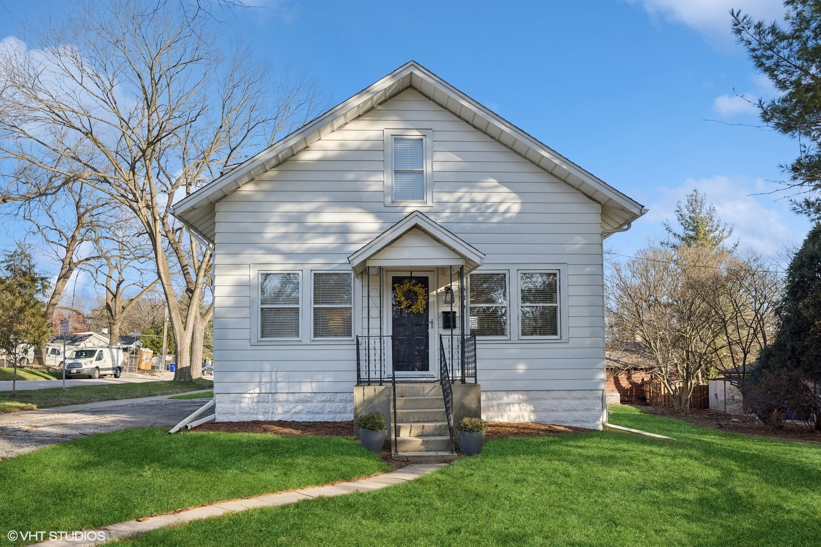 front view of a house with a yard