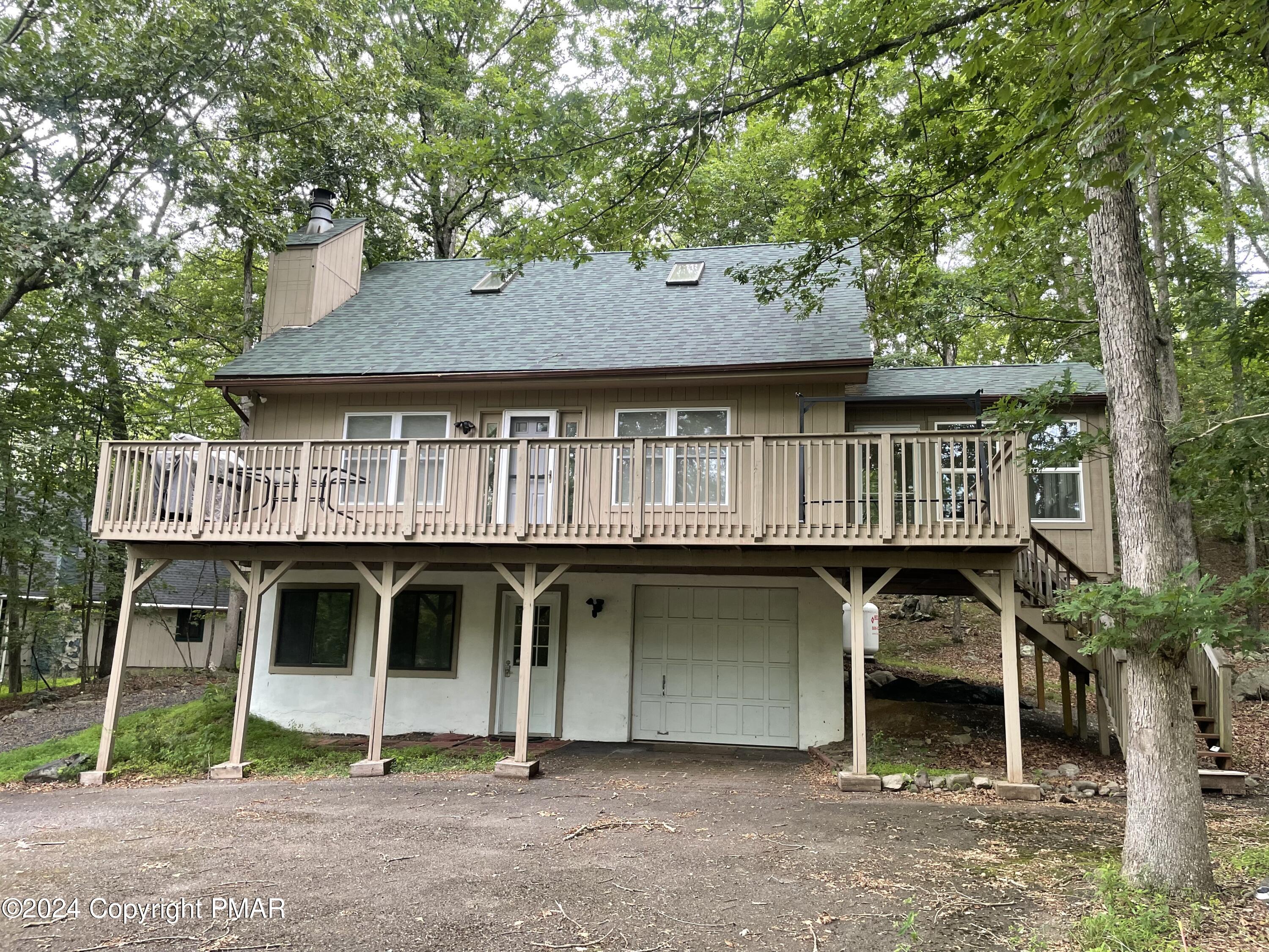 a front view of a house with balcony