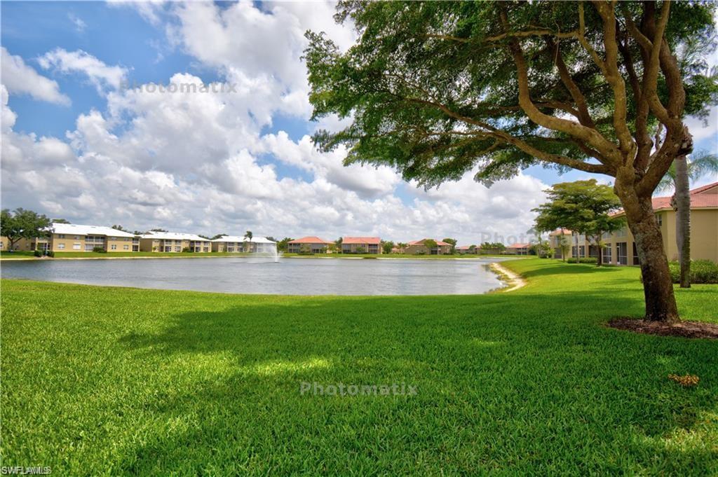 a view of a lake with a big yard