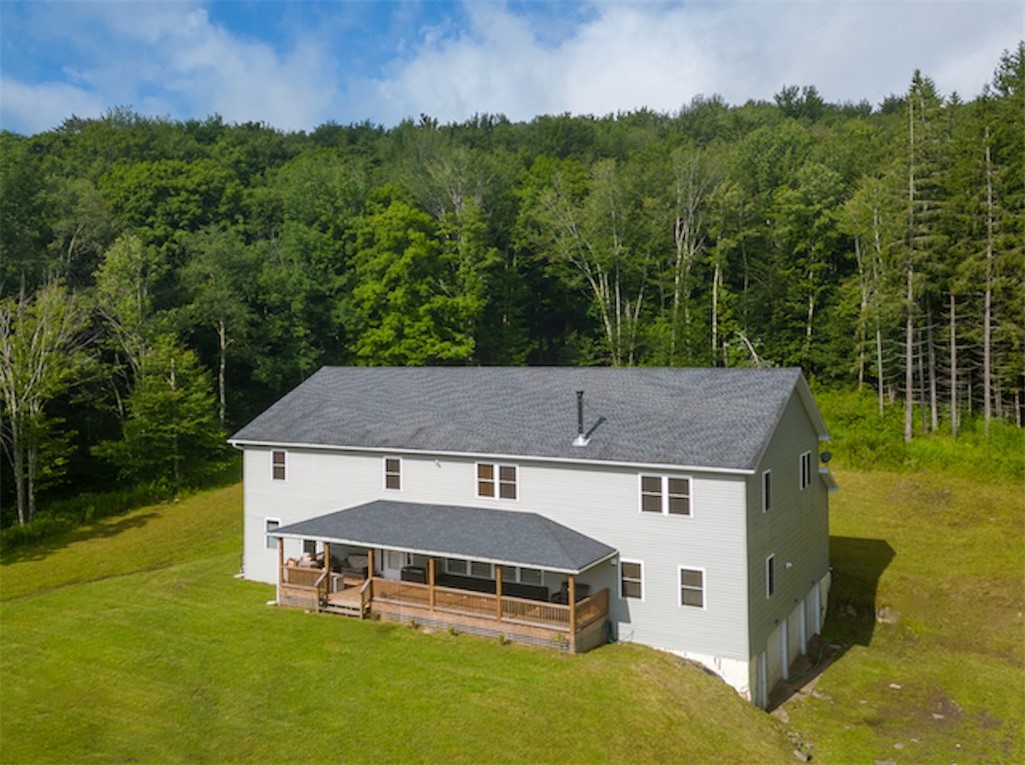 Front of the house featuring a large covered porch