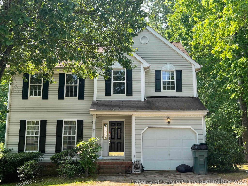 a view of house with outdoor space