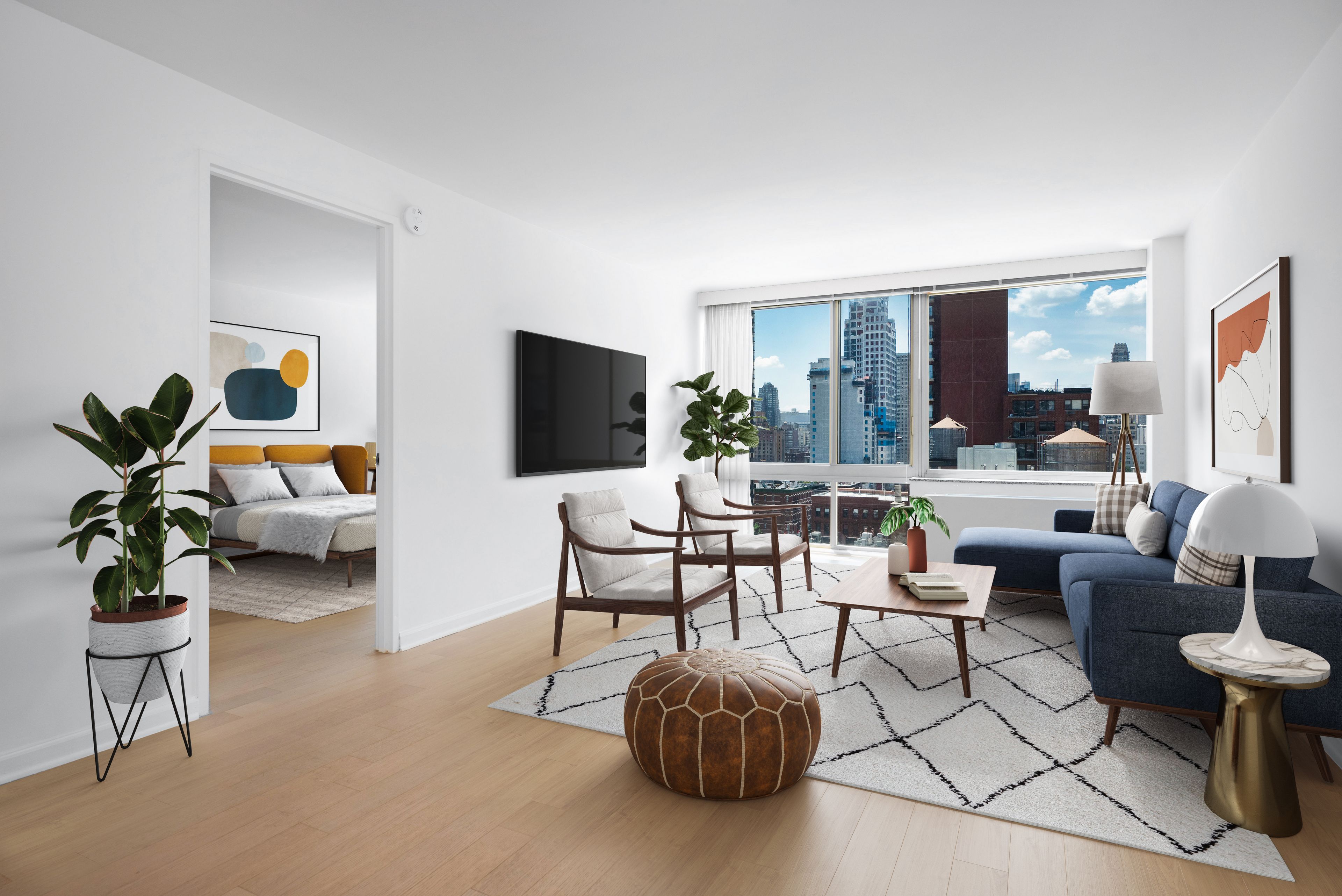 a living room with furniture a flat screen tv and a large window