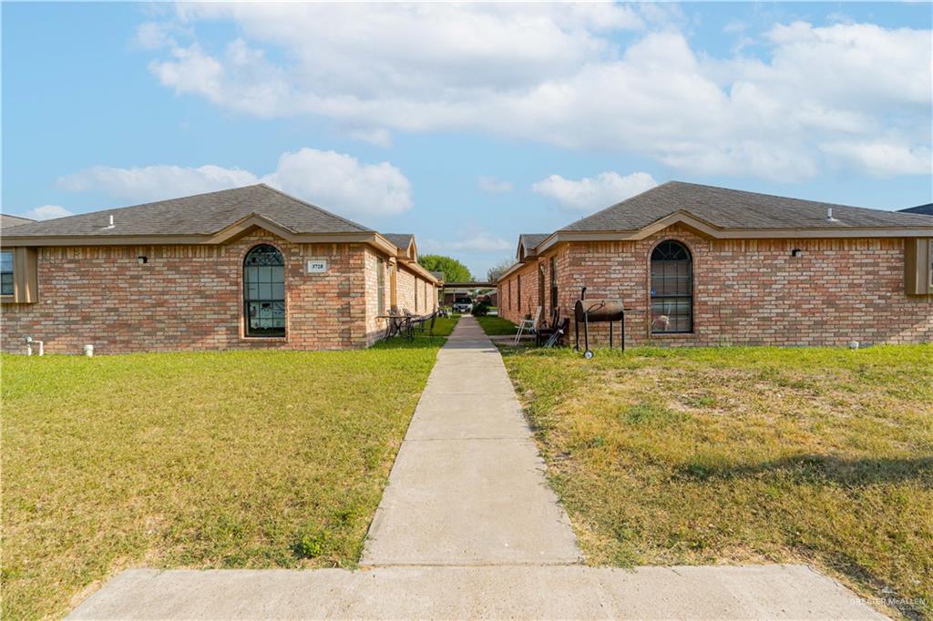 a front view of house with yard