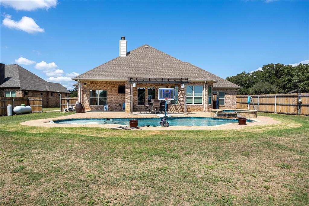 a view of a house with swimming pool