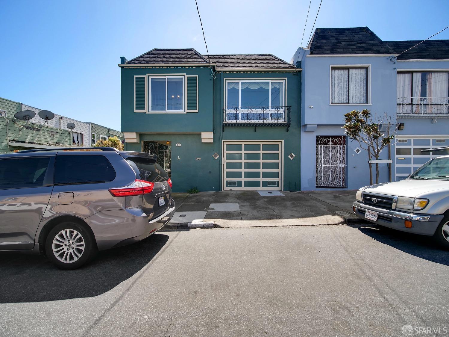 a car parked in front of a house