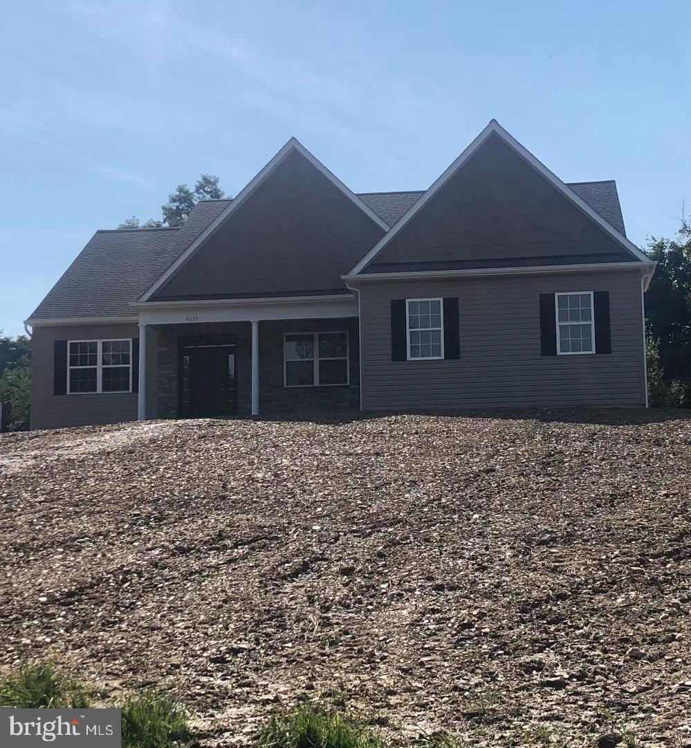 front view of house with a yard